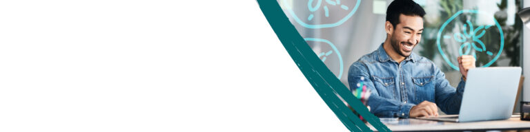 A man in a denim shirt smiles and raises his fist triumphantly while working on a laptop. Abstract turquoise graphics overlay the image, adding a dynamic feel.